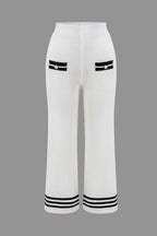 Women's knit two-piece set with cropped cardigan and wide-leg pants, black and white