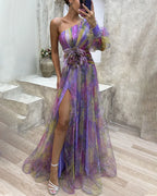Evening maxi dress one-shoulder with floral appliqué and high leg slit