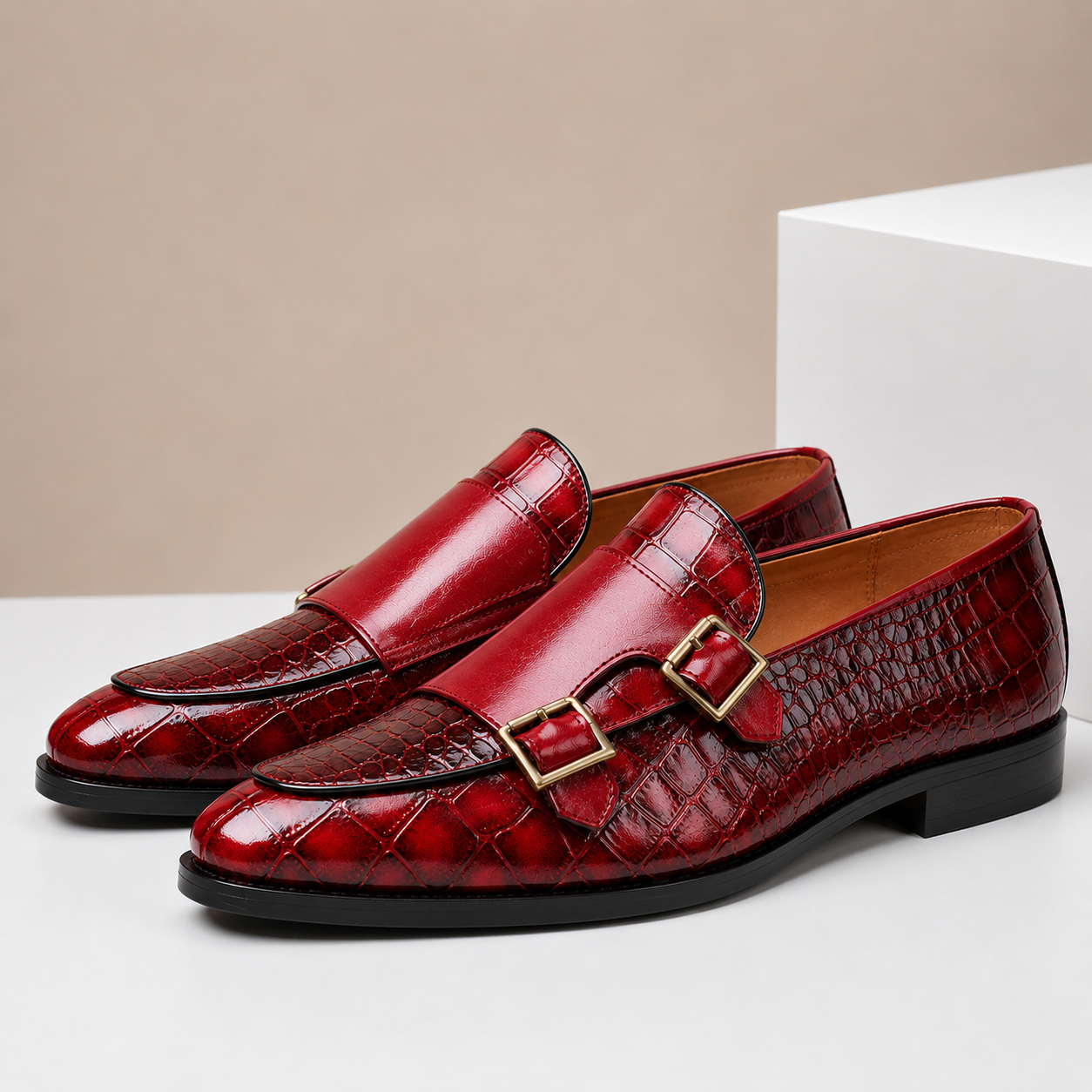 Men's leather loafers with double monk strap buckles and almond toe, crocodile-embossed finish