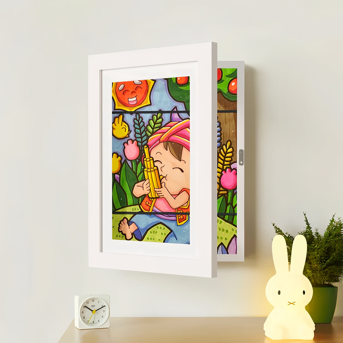 Kids drawing display frame rotating art frame stores 150 drawings, available in multiple colors