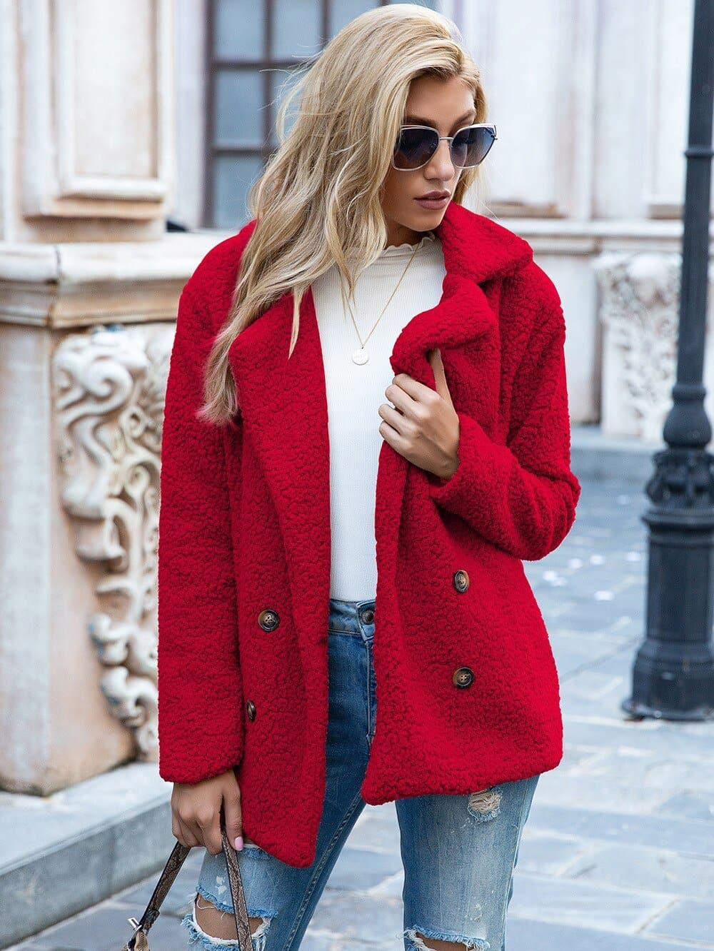 Women's mid-length coat with classic lapel collar, tailored fit outerwear