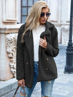 Women's mid-length coat with classic lapel collar, tailored fit outerwear
