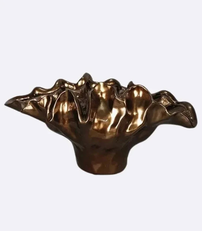 Decorative bronze resin bowl used as tabletop vase and sculptural centerpiece