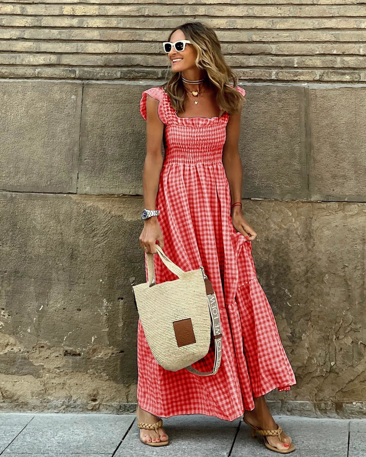 Women flutter sleeve maxi dress with fitted bodice and flowing skirt