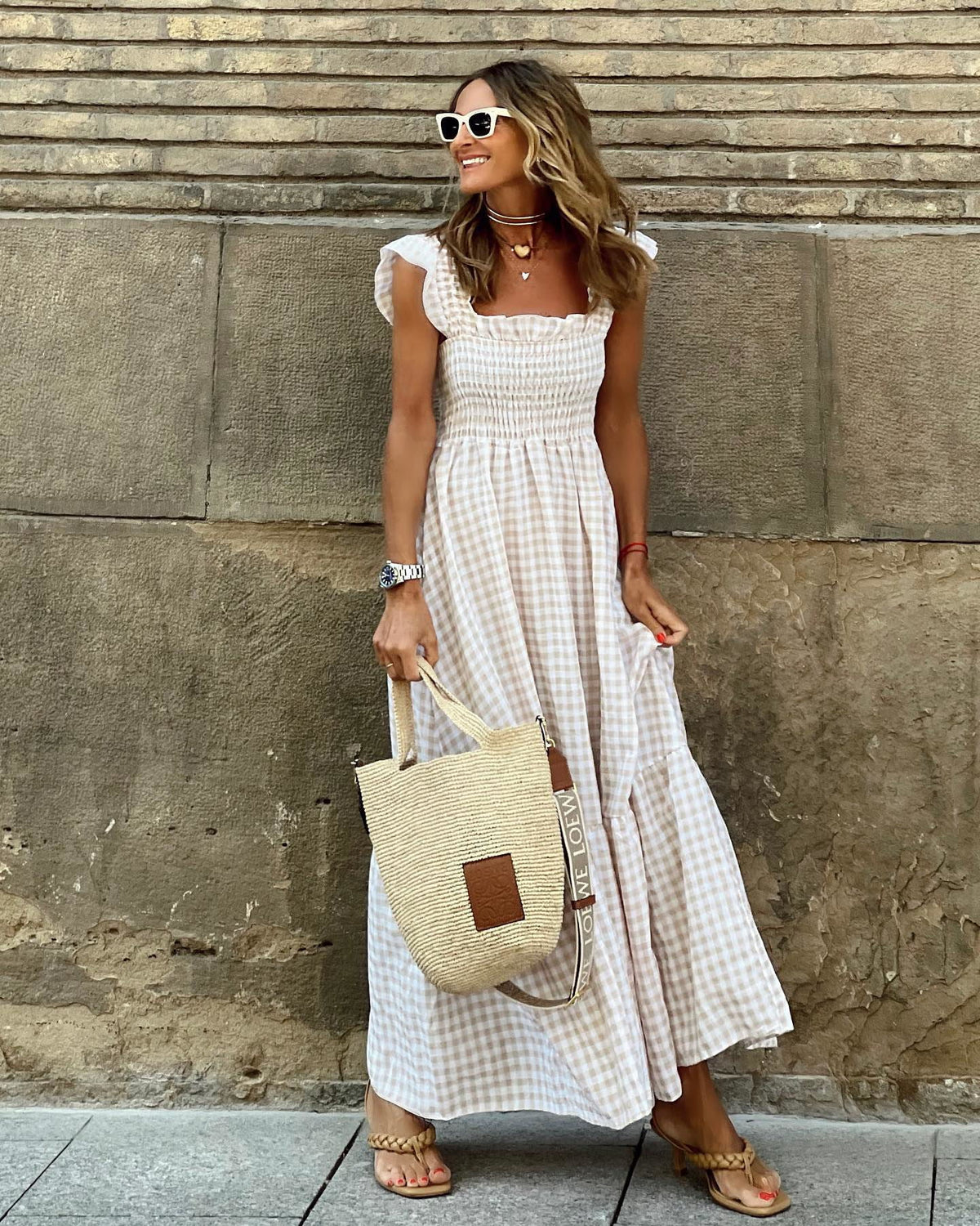 Women flutter sleeve maxi dress with fitted bodice and flowing skirt