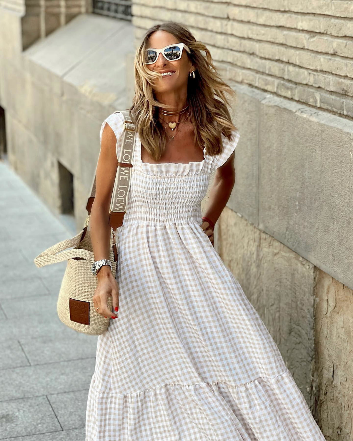 Women flutter sleeve maxi dress with fitted bodice and flowing skirt