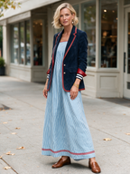 Women's striped maxi dress with spaghetti straps and red trim detail