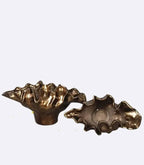 Decorative bronze resin bowl used as tabletop vase and sculptural centerpiece