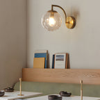 Wall lamp curved arm spherical ribbed glass shade gold finish modern indoor