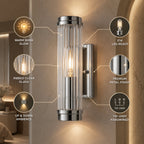 Modern wall lamp with cylindrical ribbed clear glass shade in chrome or gold finish
