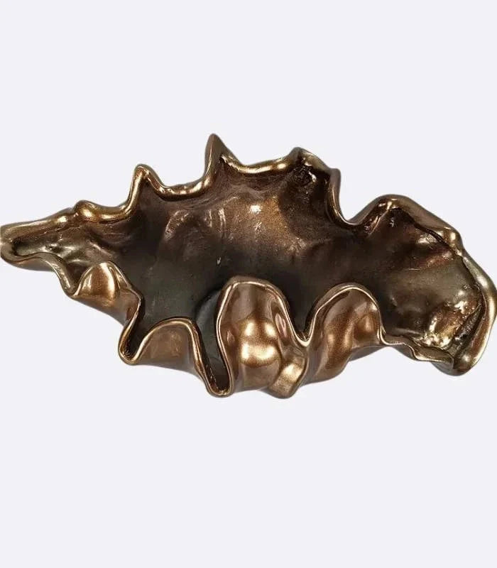 Decorative bronze resin bowl used as tabletop vase and sculptural centerpiece