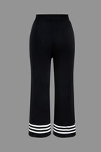 Women's knit two-piece set with cropped cardigan and wide-leg pants, black and white