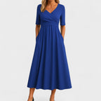 Women's midi dress with surplice V-neckline, elbow sleeves and side pockets