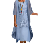 Women's flowy midi dress with sheer sleeves, perfect for wedding guests and summer occasions