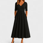 Women's midi dress with surplice V-neckline, elbow sleeves and side pockets