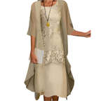 Women's flowy midi dress with sheer sleeves, perfect for wedding guests and summer occasions