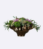 Decorative bronze resin bowl used as tabletop vase and sculptural centerpiece