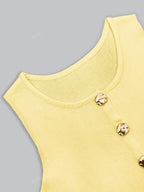 Women's sleeveless button-front peplum vest with gold buttons, tailored fit
