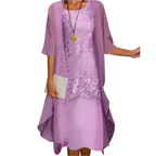 Women's flowy midi dress with sheer sleeves, perfect for wedding guests and summer occasions