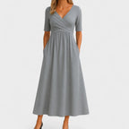Women's midi dress with surplice V-neckline, elbow sleeves and side pockets