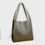 Structured handbag women's shoulder bag with zip top and tassel detail
