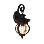Outdoor wall lantern black seeded glass globe LED curved arm 1-light