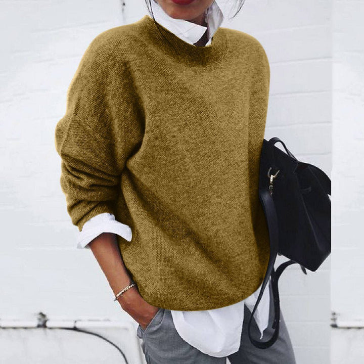 Women's cashmere sweater with classic round neck, minimalist elegant fit