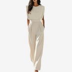 Women's jumpsuit with belted waist, minimalist elegant style, available in beige black olive