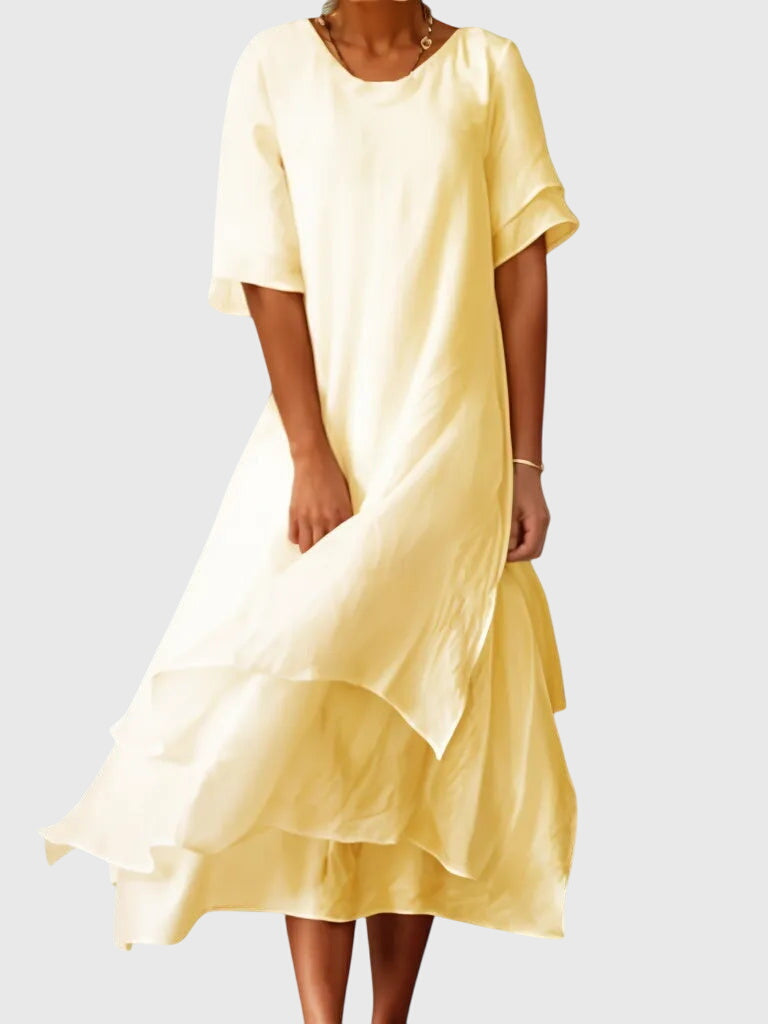 Women's elegant dress with open neckline and fluid cut, available in multiple colours