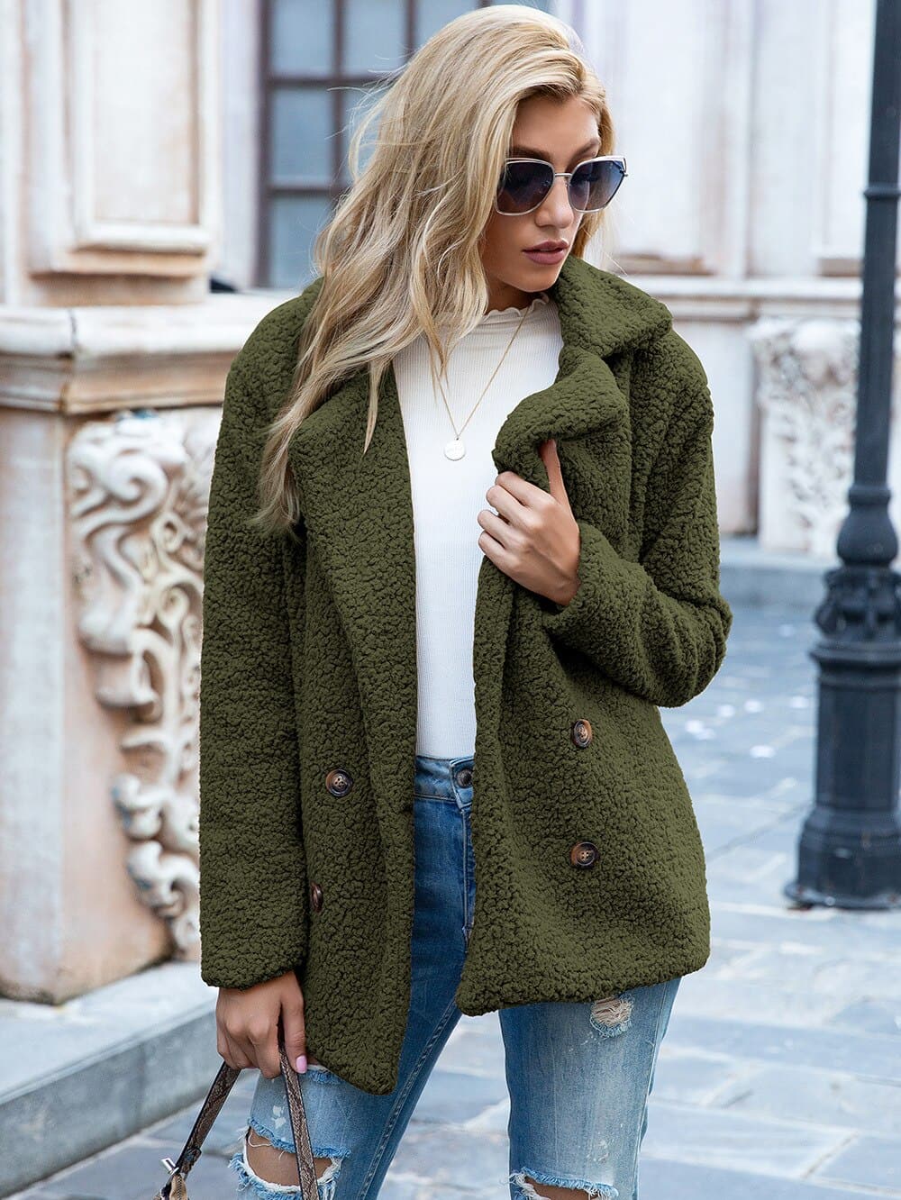 Women's mid-length coat with classic lapel collar, tailored fit outerwear