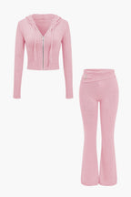 Women 2 piece knit hoodie and flared pants set with side buckle detail