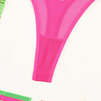 Neon lingerie set with EDM rave design in yellow, hot pink, and orange