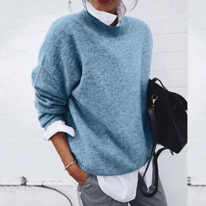 Women's cashmere sweater with classic round neck, minimalist elegant fit