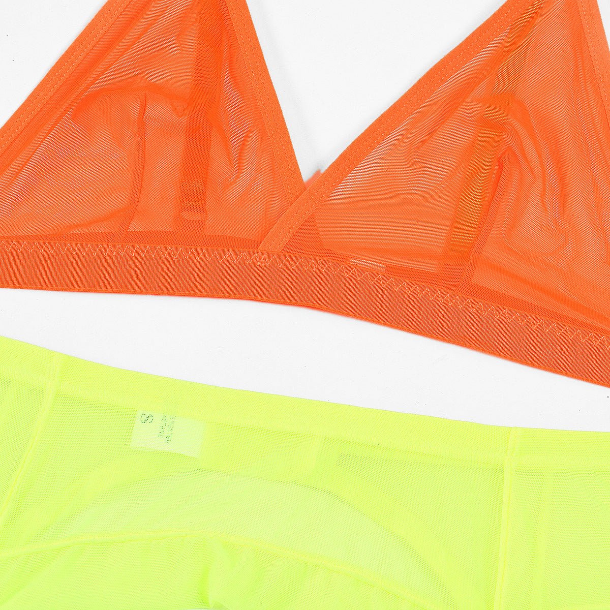 Neon lingerie set with EDM rave design in yellow, hot pink, and orange