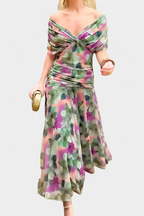 Women's floral midi dress with V-neckline and pleated waist, elegant long flowing skirt