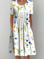 Women pleated floral midi dress with side pockets in soft-touch fabric