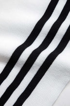 Women's knit two-piece set with cropped cardigan and wide-leg pants, black and white