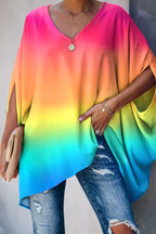 Women oversized tunic top with batwing sleeves and V-neckline, asymmetric hem