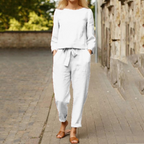 Women 2 piece blouse and trouser set with round neckline and long sleeves