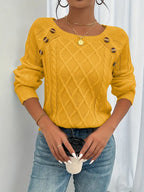 Women's winter cable knit pullover sweater with decorative button detail
