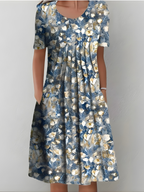 Women pleated floral midi dress with side pockets in soft-touch fabric