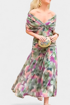 Women's floral midi dress with V-neckline and pleated waist, elegant long flowing skirt