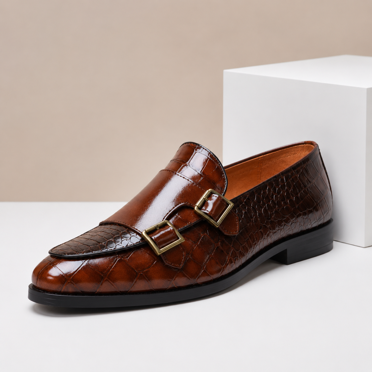 Men's leather loafers with double monk strap buckles and almond toe, crocodile-embossed finish