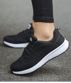 Women's ergonomic sneakers with arch support and breathable upper, wide fit