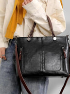 Women leather shoulder bag with magnetic snap closure and adjustable strap