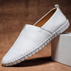 Men pebbled grain leather look slip on loafers with whipstitch sole detail
