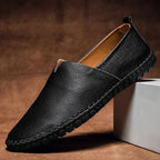 Men pebbled grain leather look slip on loafers with whipstitch sole detail