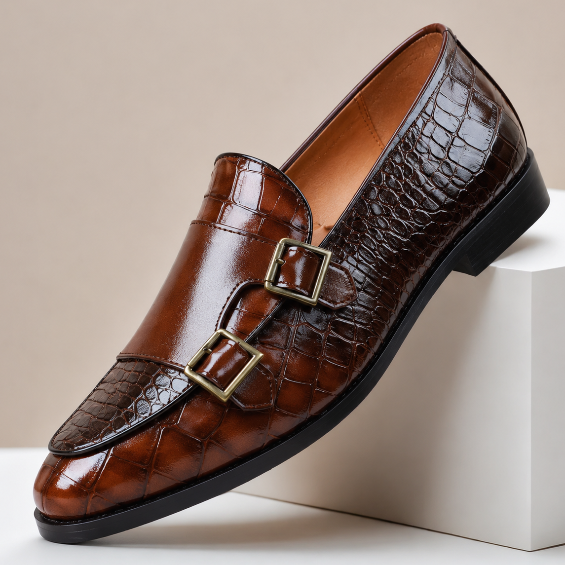 Men's leather loafers with double monk strap buckles and almond toe, crocodile-embossed finish