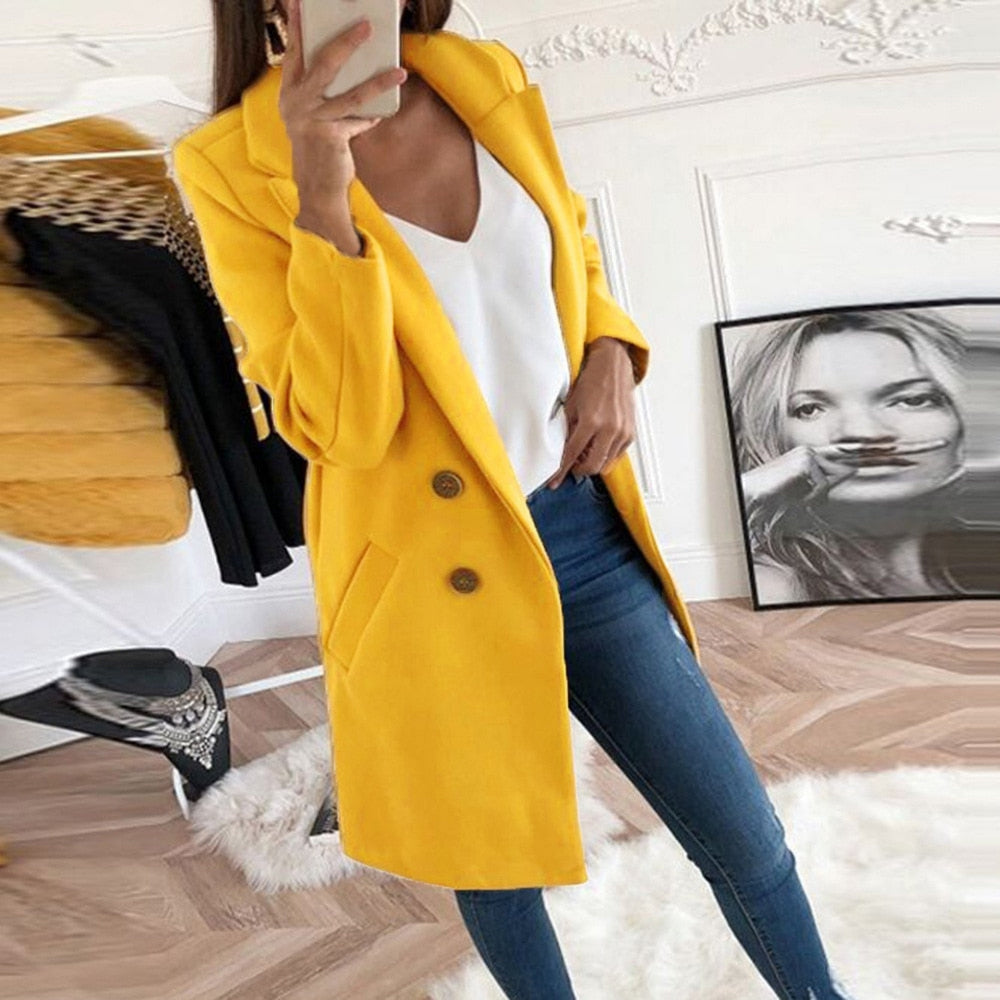 Women's long button-up coat with side pockets, elegant elongated silhouette