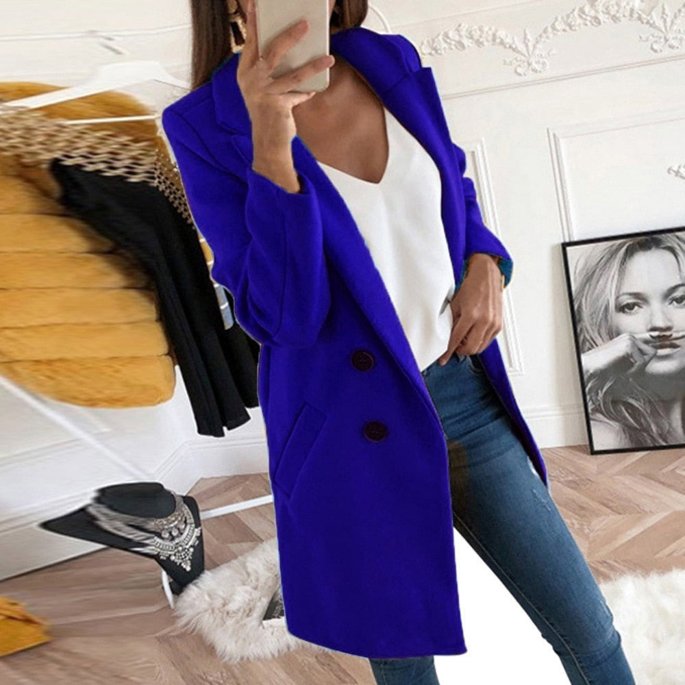 Women's long button-up coat with side pockets, elegant elongated silhouette
